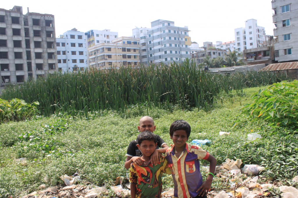kids in field in Dhaka